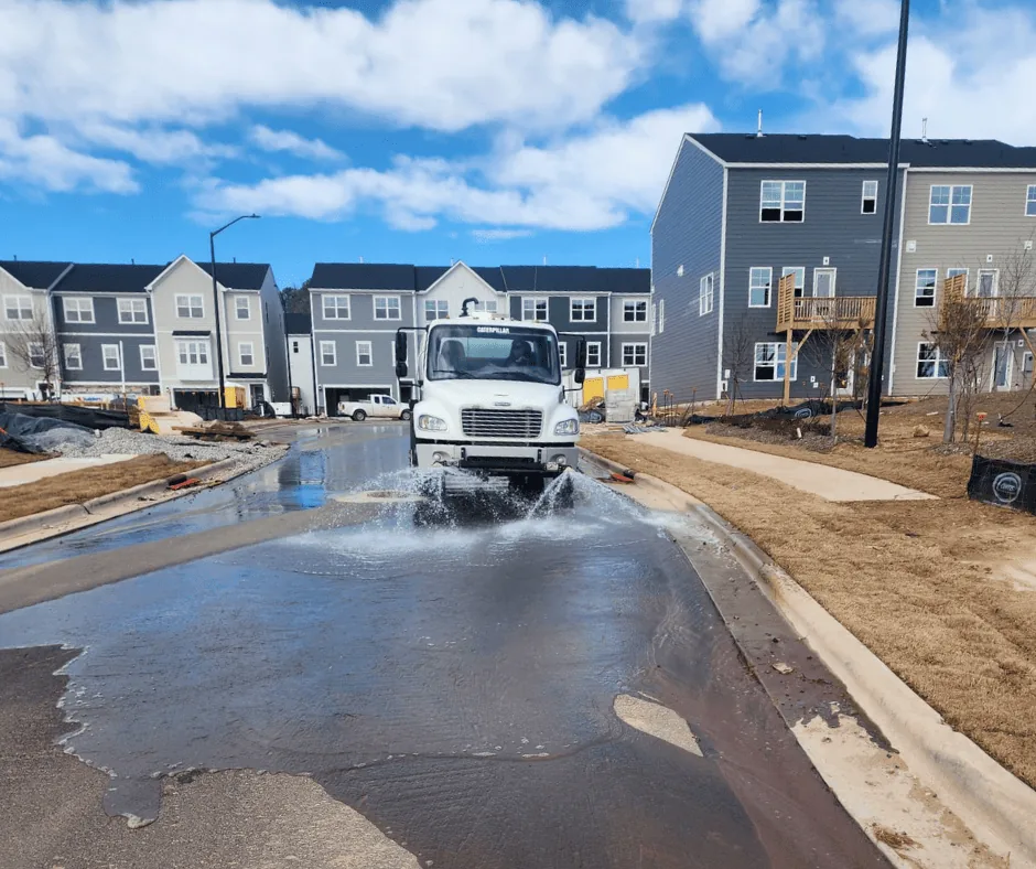 Street washing to remove sediment from a road