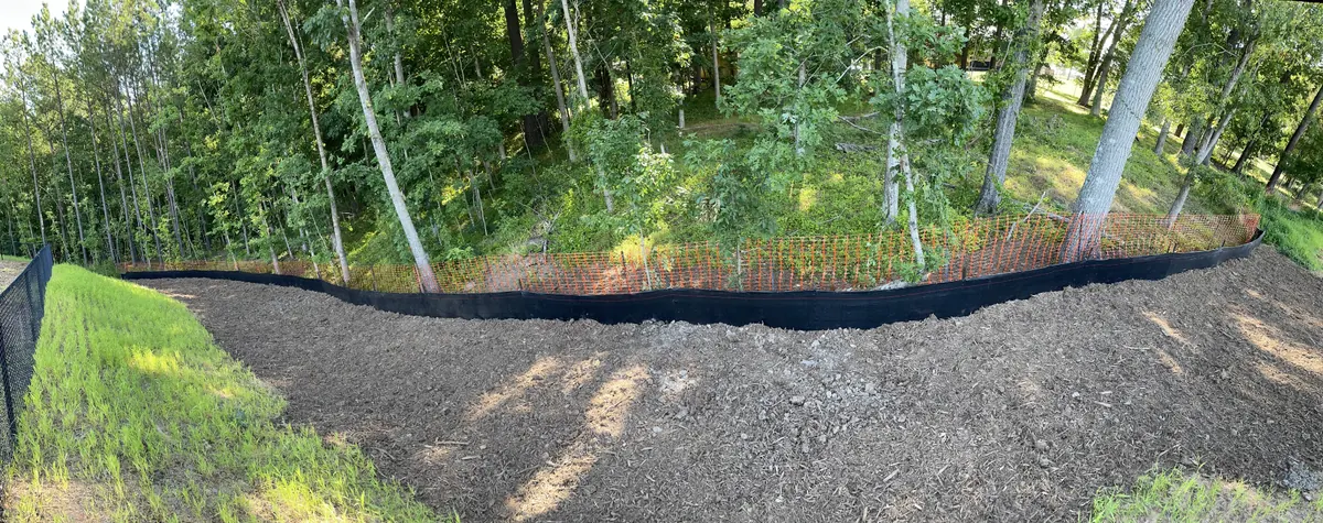 Silt fence line at a wooded site