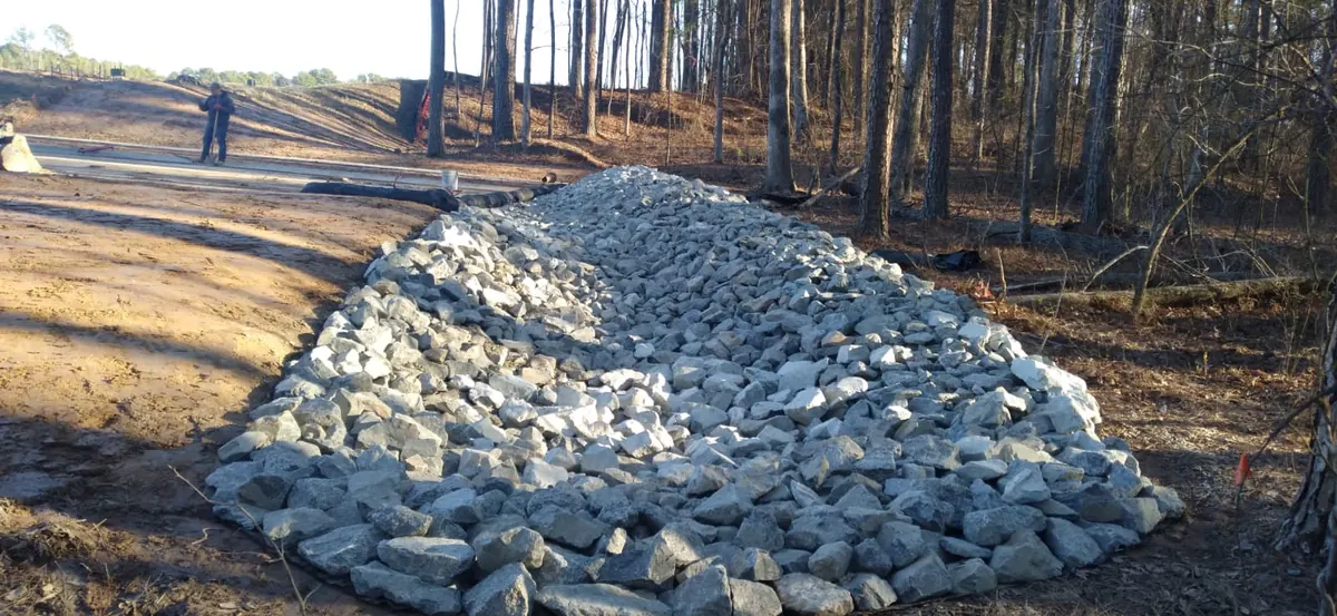 Stone reinforced drainage channel