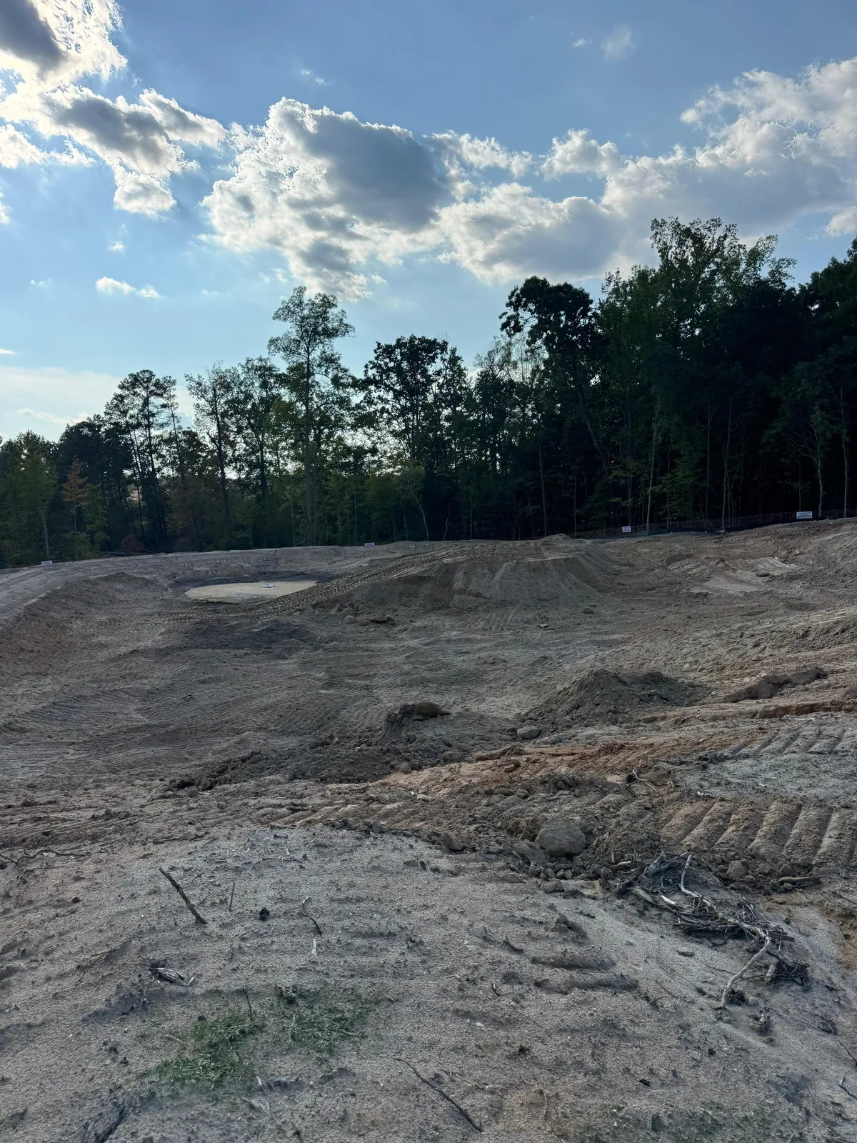 Grading a stormwater basin slope at Banks Twenty