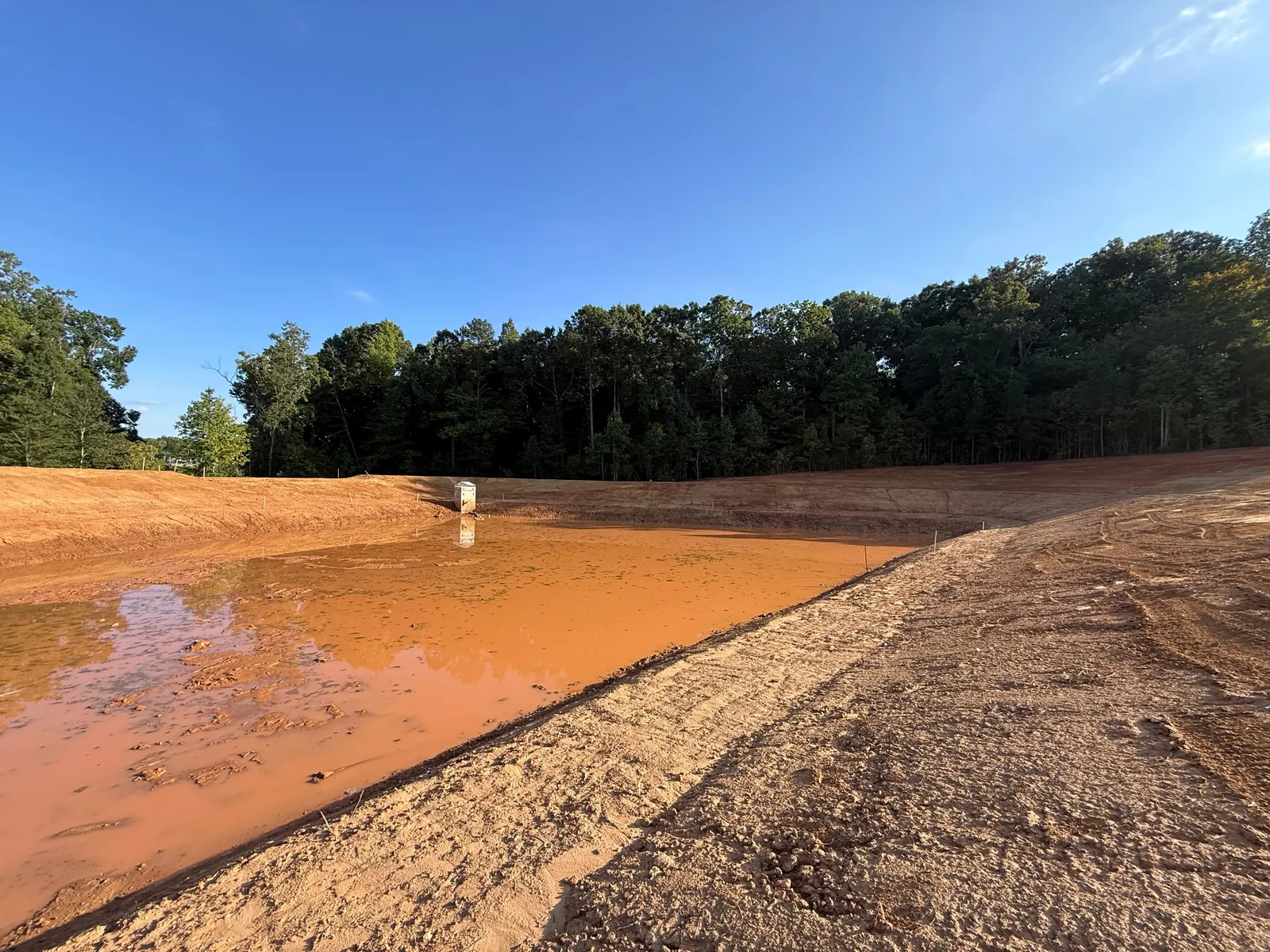 Grading a stormwater basin at Sagecroft