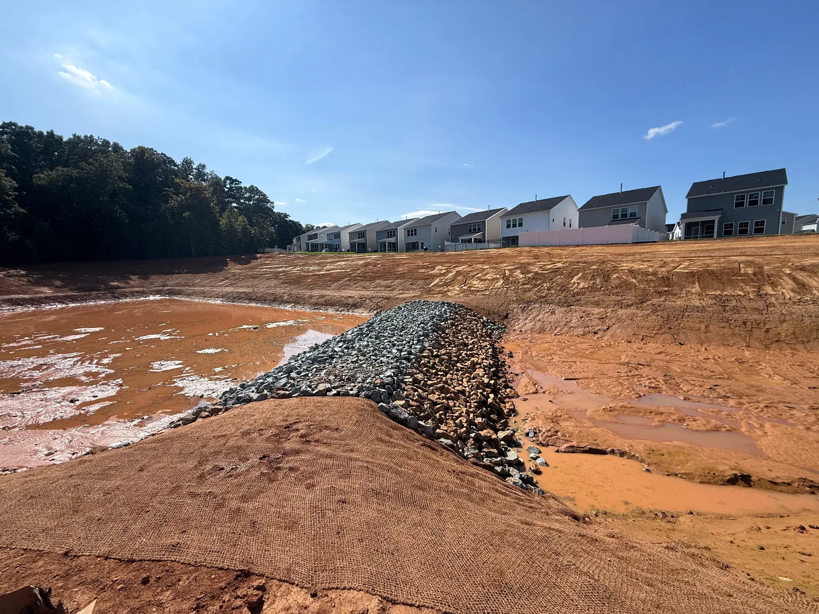 Rip-rap lined stormwater basin at Sagecroft