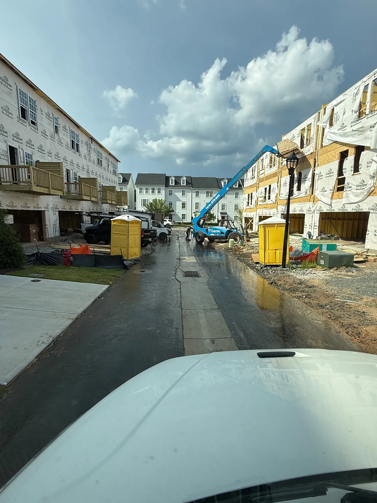 Freshly washed street at a townhome construction site