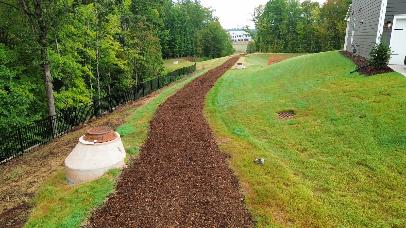 Aerial view of a finished stormwater channel at Ovation at Sweetbrier